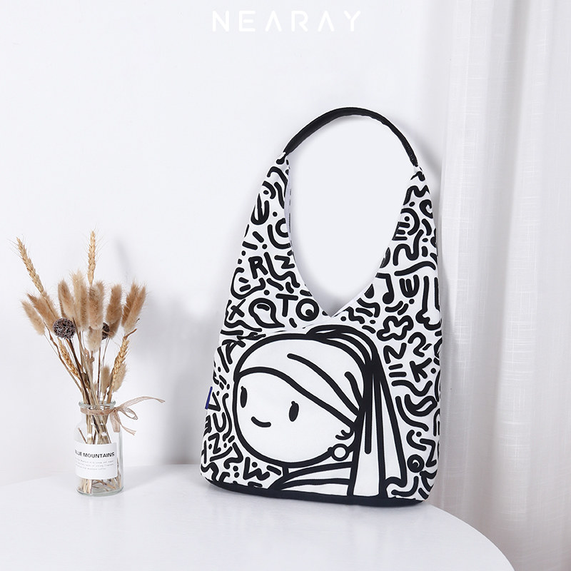 尼睿2022新款原创水桶包小众帆布包 尼睿女士包袋