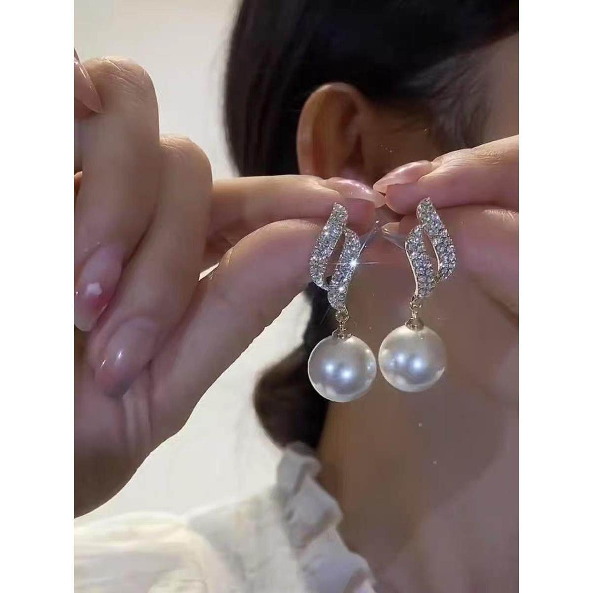 双向奔赴设计感珍珠耳环2025年新款潮气质耳饰网红百搭耳坠女,淘宝优惠券,粉丝福利购,淘宝优惠卷