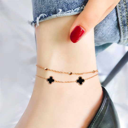 Personalized Korean style double-layered four-leaf flower anklet for female Internet celebrities, sexy rose gold titanium steel niche design anklet