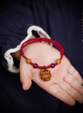 宝宝桃核手链婴儿红绳僻邪朱砂