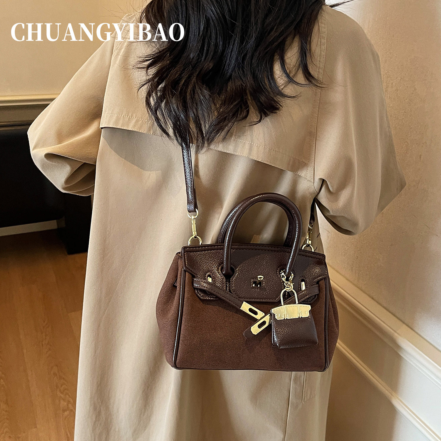 秋冬超火手提麂皮凯莉包包女2025新款轻奢小众高级感通勤斜挎小包,淘宝优惠券,粉丝福利购,淘宝优惠卷