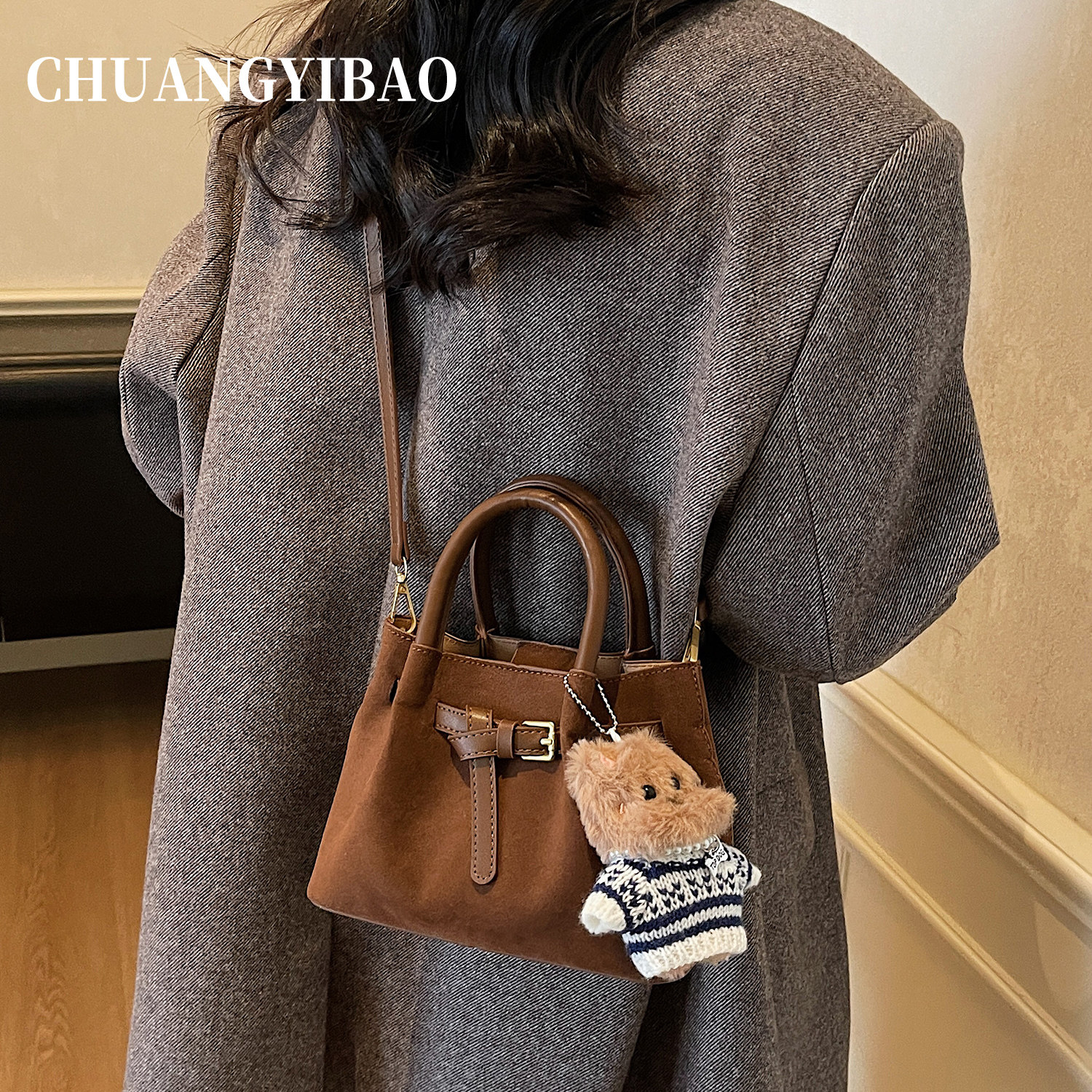 超火棕色水桶手提小拎包包女2025新款秋冬季轻奢小众高级感斜挎包,淘宝优惠券,粉丝福利购,淘宝优惠卷