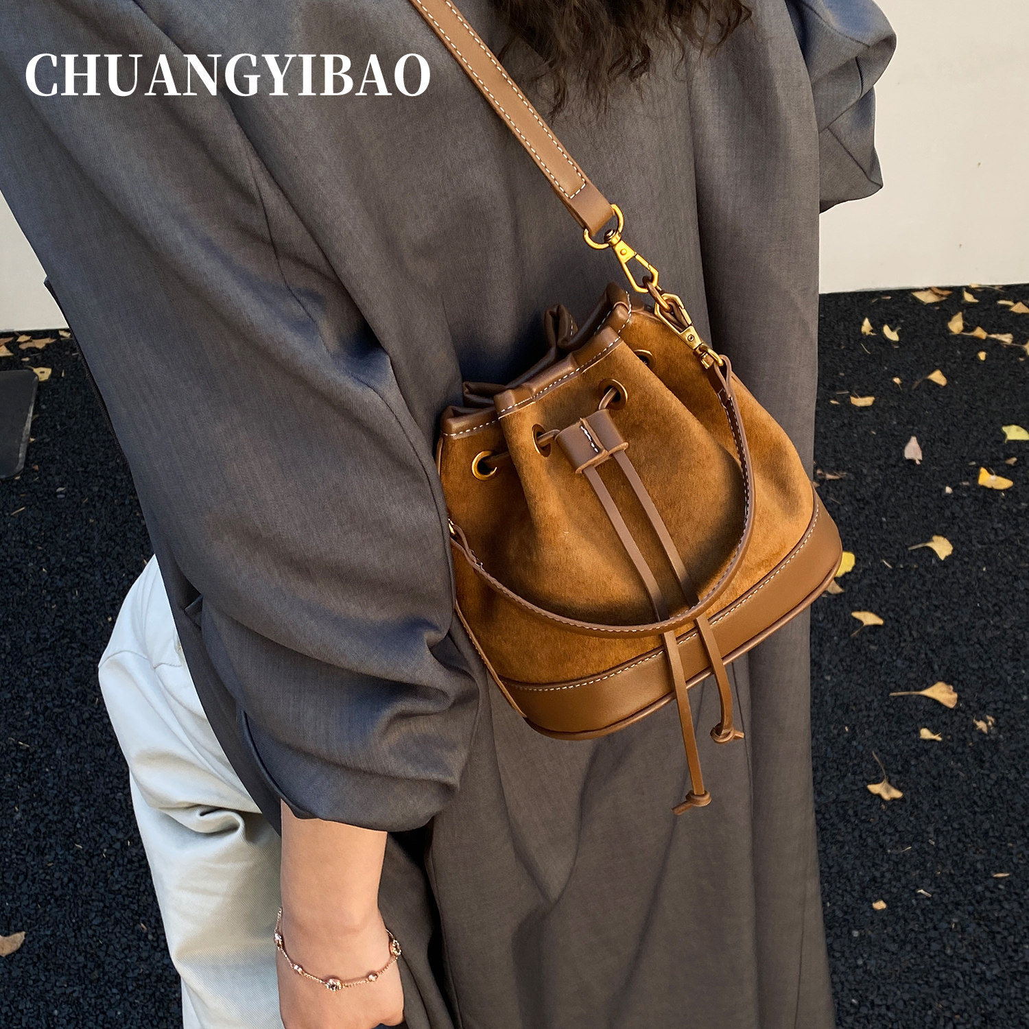 复古抽绳水桶包包女士2025新款秋冬高级感轻奢小众设计斜挎手提包,淘宝优惠券,粉丝福利购,淘宝优惠卷