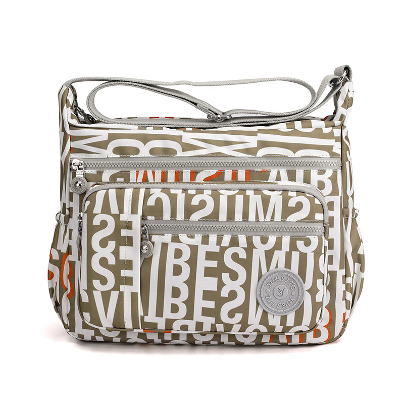 牛津布斜挎单肩包女士2025夏新款大容量尼龙旅行包书包帆布妈妈包,淘宝优惠券,粉丝福利购,淘宝优惠卷