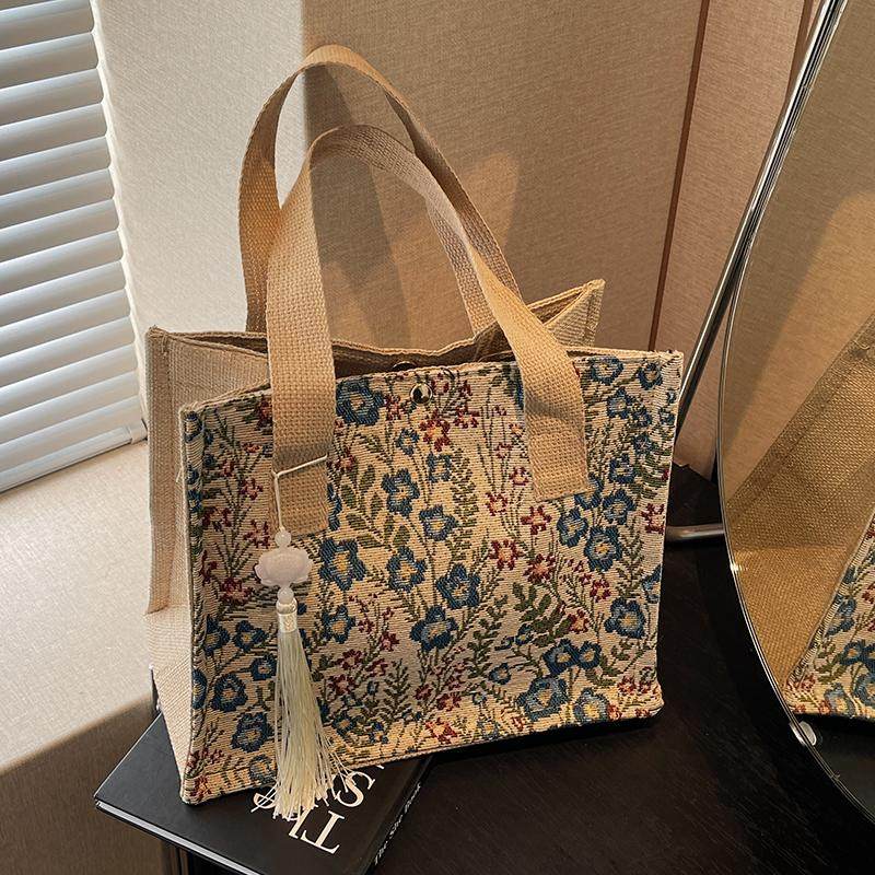 今年流行包包女2025新款麻布手提袋女ins上课通勤百搭碎花托特包,淘宝优惠券,粉丝福利购,淘宝优惠卷