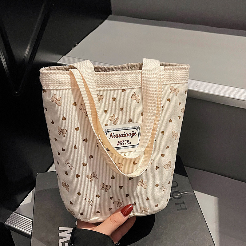 网红ins灯芯绒水桶包包女2025新款潮时尚手提包女洋气百搭手拎包,淘宝优惠券,粉丝福利购,淘宝优惠卷