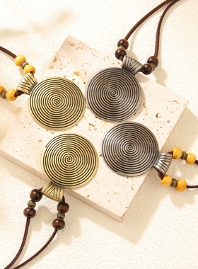 热销牛皮绳民族吊坠皮革饰品指纹合金毛衣链个性复古圆形项链