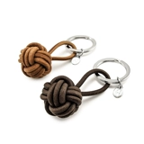 Креативный плетеный кожаный брелок ручной работы подходит для мужчин и женщин для влюбленных, аксессуар на рюкзак, простой и элегантный дизайн, из натуральной кожи