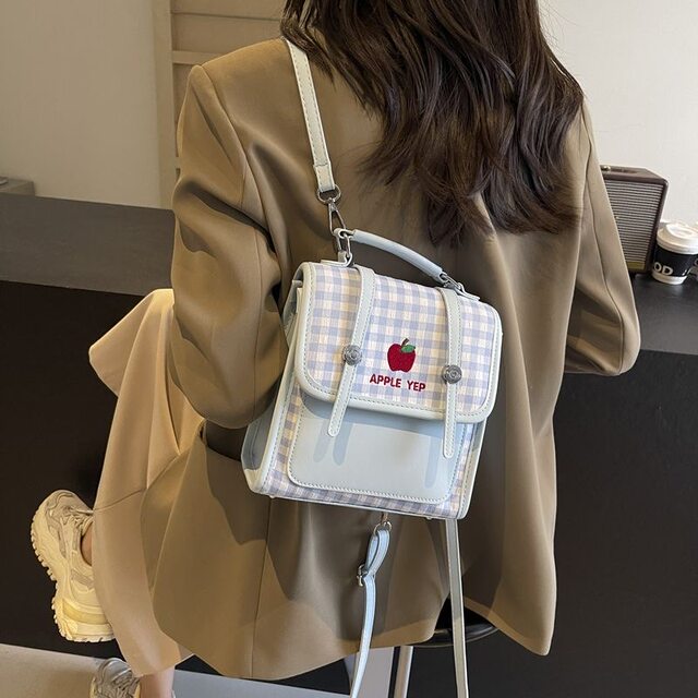 Korean version of fresh college style backpack for women in 2025 new fashionable and versatile high-end shoulder crossbody bag