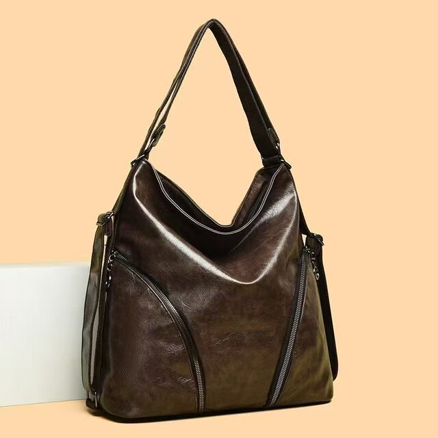 2026 new high-end texture women’s backpack, fashionable and versatile large-capacity zipper travel shoulder tote bag