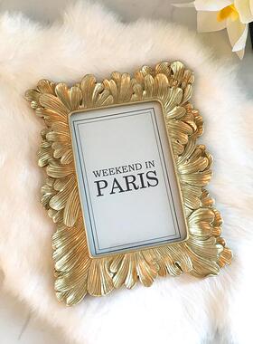 厂家直销婚纱照7寸欧式摆台羽毛创意相框树脂工艺简约挂墙照片框