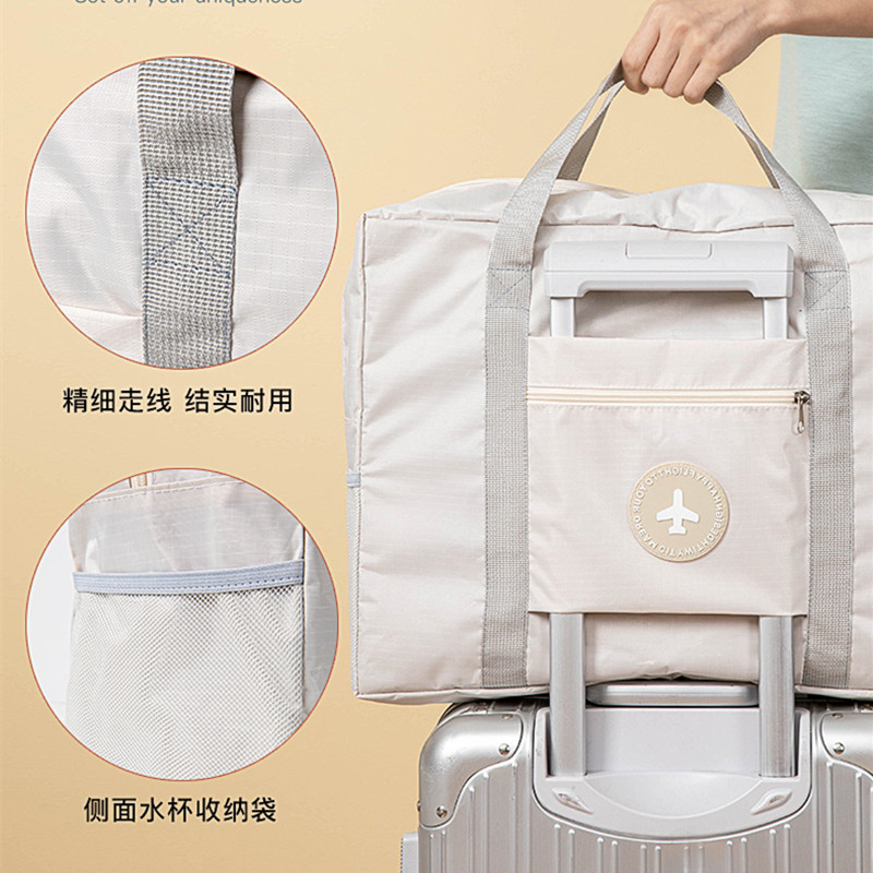 手提旅行登机包大容量防水简约轻便携折叠短途行李袋子套拉杆箱包,淘宝优惠券,粉丝福利购,淘宝优惠卷