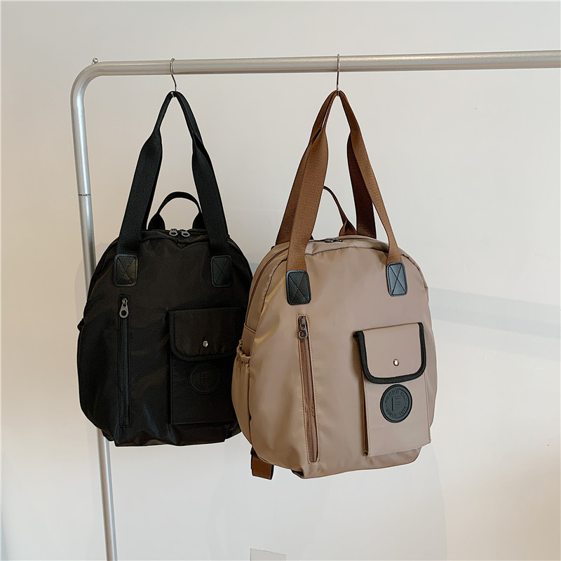 双肩包女2025春秋新款超大容量手提单肩撞色旅行包通勤休闲托特包,淘宝优惠券,粉丝福利购,淘宝优惠卷