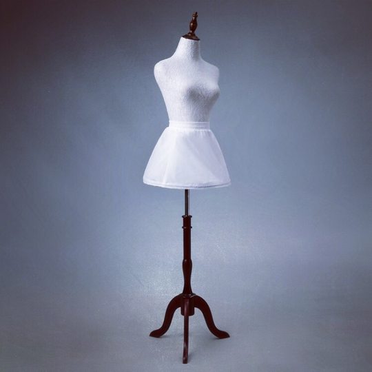 Girls' white skirt with bustle skirt