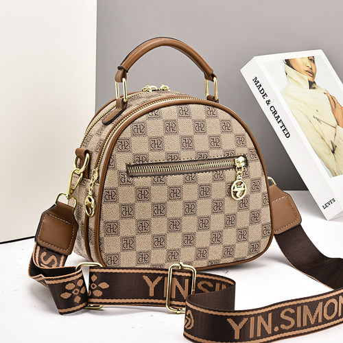 斜挎包女2026新款百搭休闲小圆包宽肩带日常上班通勤手提包小拎包 - 图1