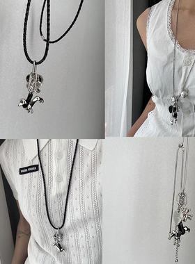 义乌市陌然饰品小众设计感爱心小狗花朵唱黑色皮绳项链简约博主同