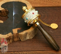 Tibetan transfer via simple handshaking gold wheel Lhasa handheld transfer gold barrel Tibetan gold transfer cylinder Tibetan area brigade shooting props swing piece