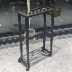 Floor-standing racket storage display rack for home use