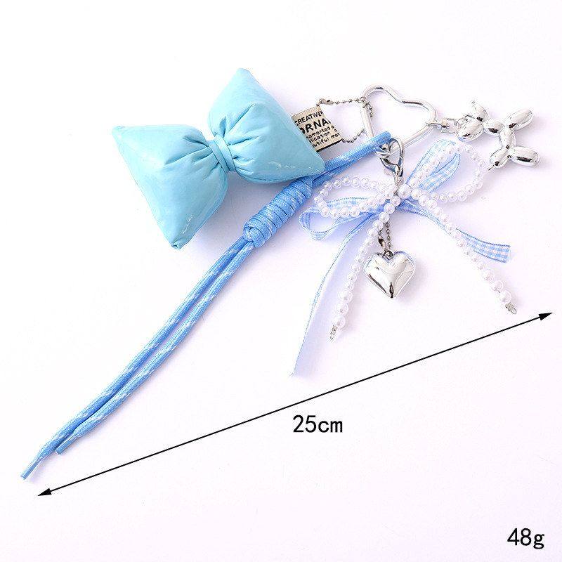 创意新款爱心珍珠蝴蝶结挂件miu系编织绳包包挂饰装饰品手机挂件,淘宝优惠券,粉丝福利购,淘宝优惠卷