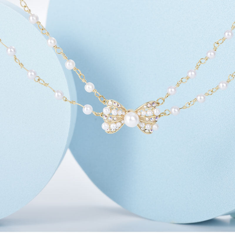 简梵洛女夏白色珍珠蝴蝶结感锁骨链 简梵洛项链