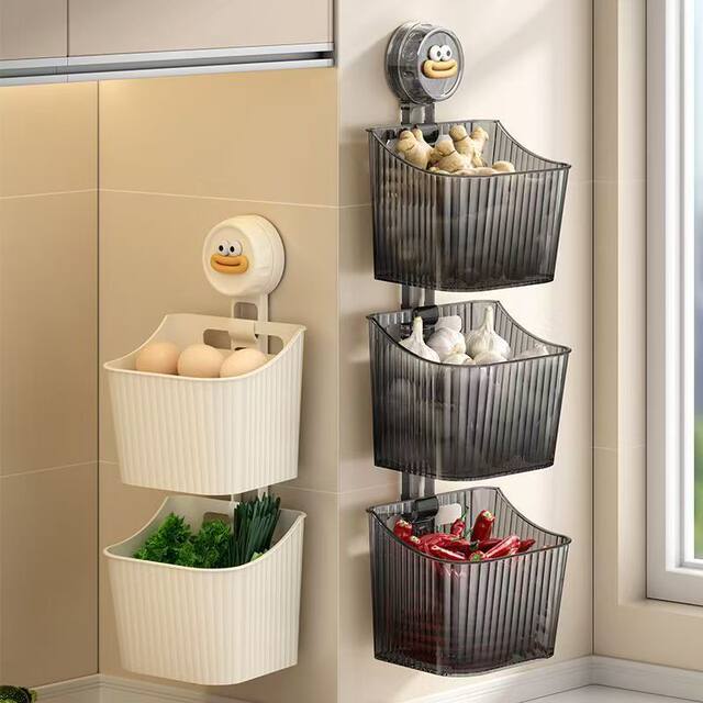 Suction cup onion, ginger and garlic storage box kitchen storage rack wall-mounted ginger and garlic storage artifact without punching storage hanging basket