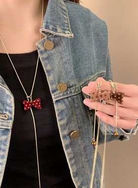 红色波点蝴蝶结抽拉项链秋冬小众设计可爱毛衣链超好看独特配饰