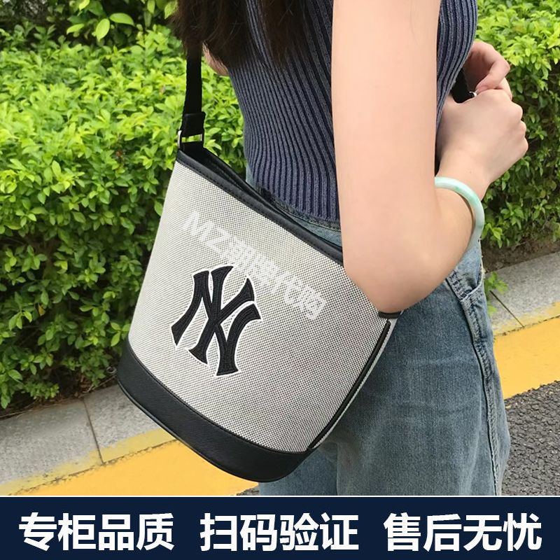 ml斜跨水桶包ny高级感情侣单肩手提托特包女帆布经典时尚休闲漂流