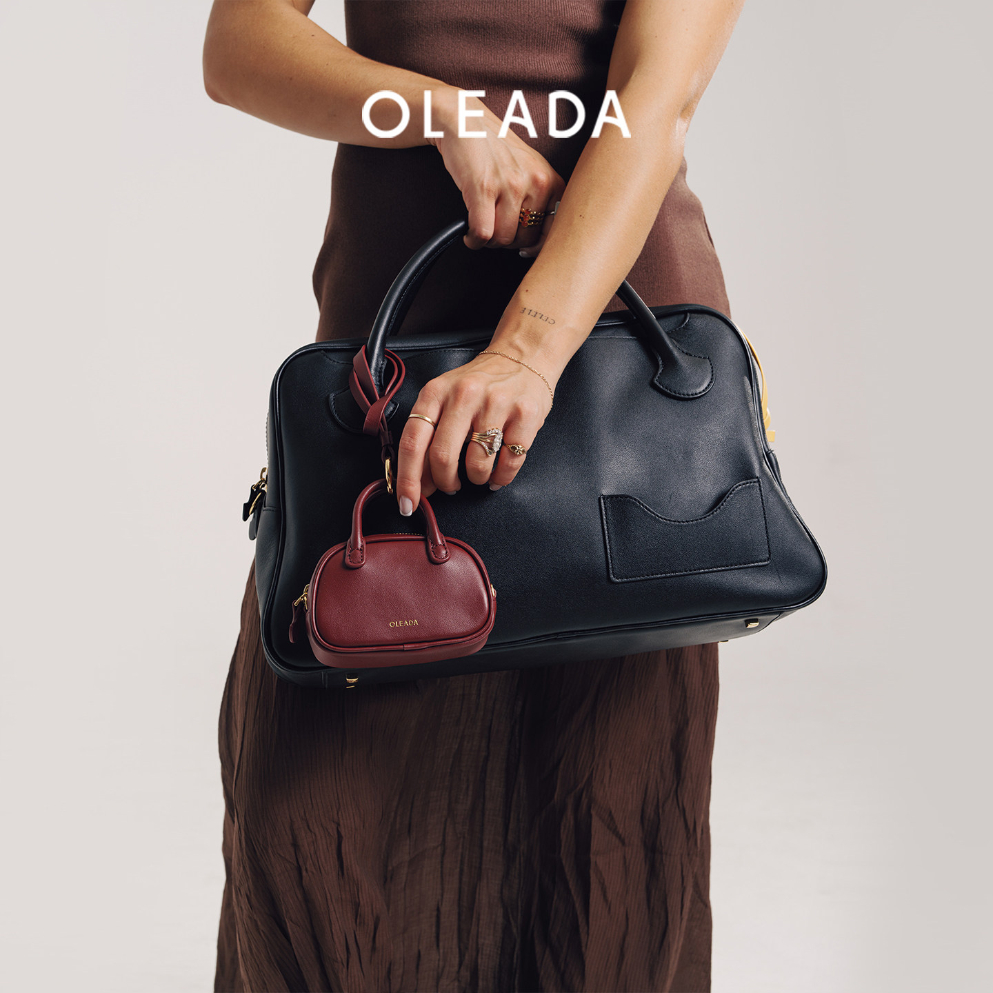 OLEADA灯塔保龄球包新款经典时尚高级感大容量通勤手提波士顿包女,淘宝优惠券,粉丝福利购,淘宝优惠卷