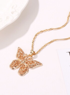 MetalBurflyPendNeckWo
