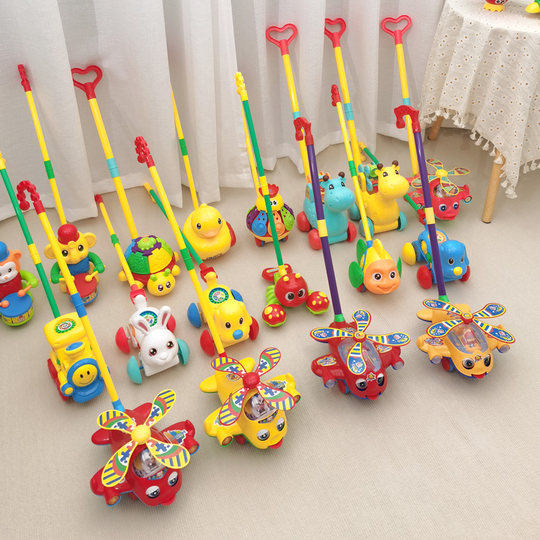 Juguete de empuje para cochecito de niño pequeño