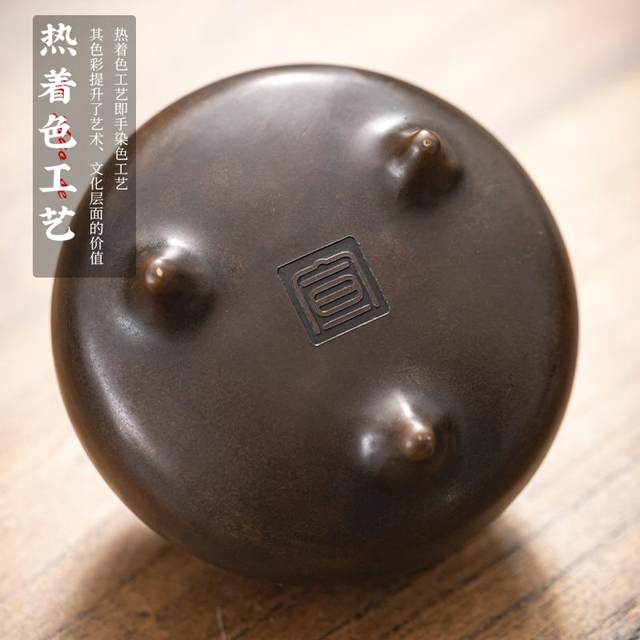 The copper incense burner weighs 1.25 kg and comes with a chicken wing wood base.