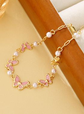 日本portney bell年新款粉色滴釉蝴蝶珍珠手链女高级感精致