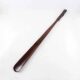 Solid wood shoehorn with long handle for home use as a shoe-wearing tool for pregnant women