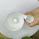 Multifunctional automatic rinsing fruit and vegetable drain basket
