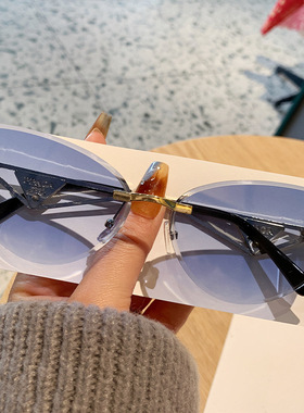 2025新款无框高档墨镜女镂空金属镜架高级感猫眼镜时尚防晒太阳镜