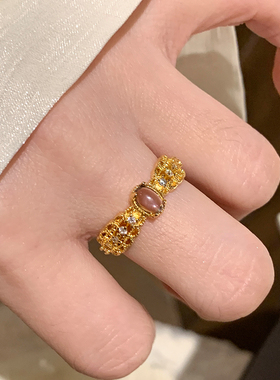 淡紫鸽子蛋镂空花丝金色戒指女