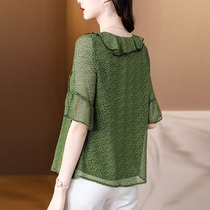 2023 Early autumn new lotus leaf side lead crushed flower mid-sleeve female blouse 70% sleeves loose cover belly snow-jersey woman