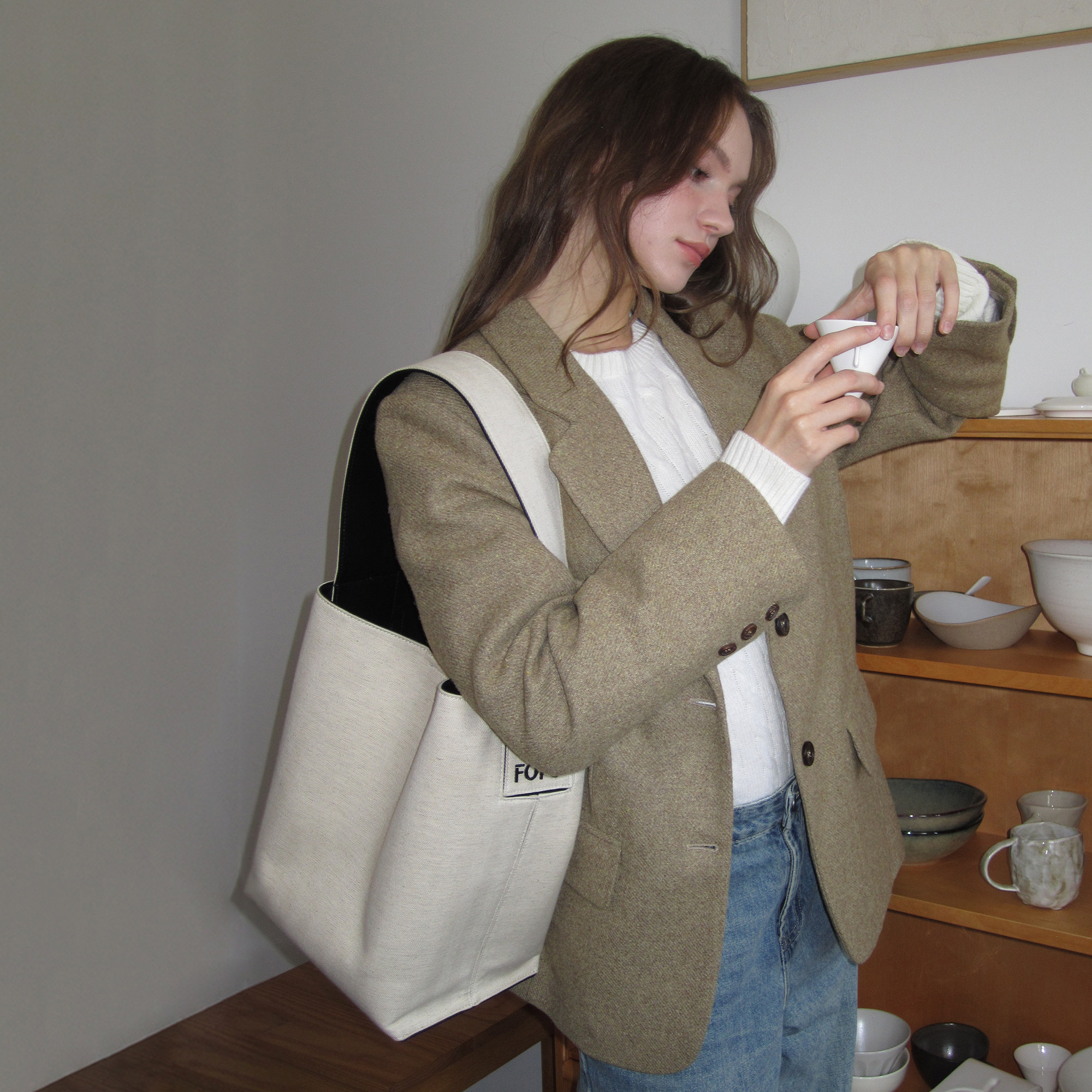 FOFO树洞水桶包女新款原创小众单肩包设计师手提牛皮拼接帆布包包,淘宝优惠券,粉丝福利购,淘宝优惠卷