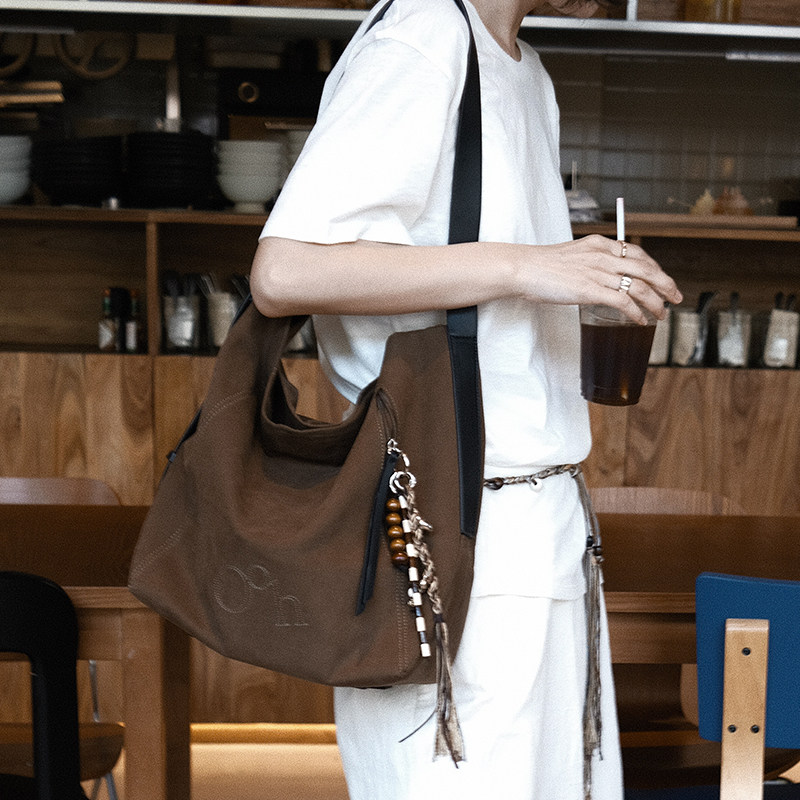 Oohhygge.复古大容量水桶包可调节肩带单肩斜挎百搭日常通勤包包,淘宝优惠券,粉丝福利购,淘宝优惠卷