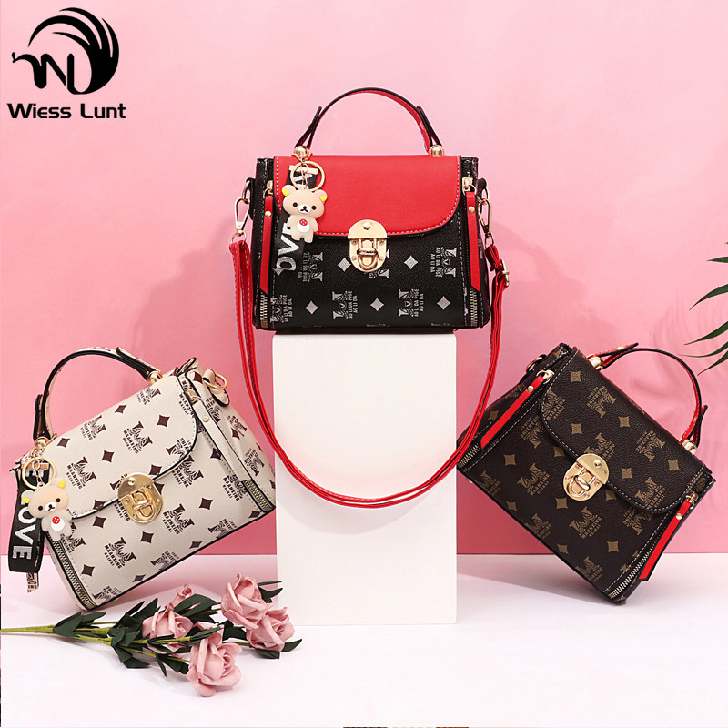 2020新款旋锁气质春夏斜跨包小方包 威斯伦特女士包袋