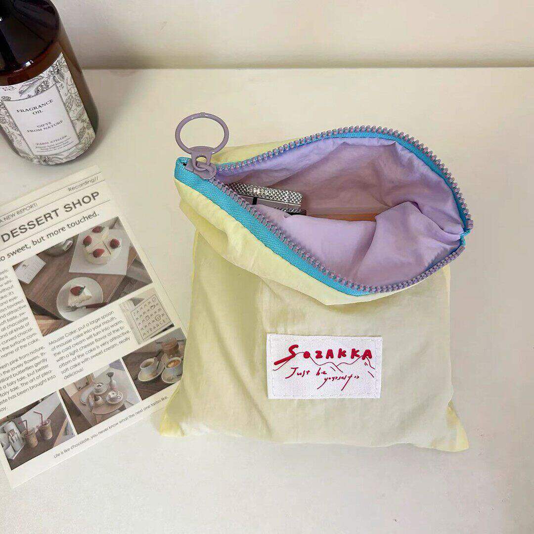 马卡龙收纳外出便携简约小包撞色多巴胺薄款化妆包零钱口红收纳袋