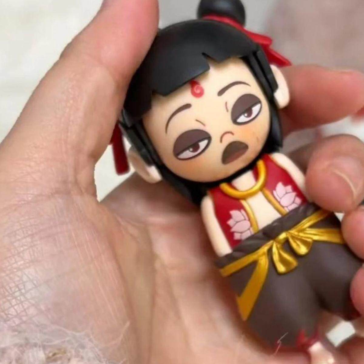 哪咤之魔童闹海变脸玩具哪吒表情包变脸按压变脸挂件摆件趣味创意