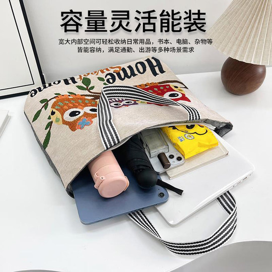 大容量包包女生通勤外出帆布包卡通文艺宝爸妈带娃收纳包带拉链