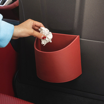 Vehicular garbage can in car interior with front hanging car umbrella containing box for garbage bags decorative items