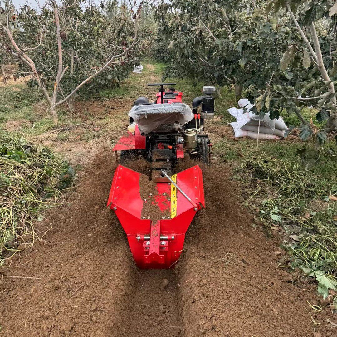 Multifunctional orchard soil loosening rotary tiller, ride-on fruit tree fertilization trenching machine, flood and drought dual-purpose crawler micro-tiller