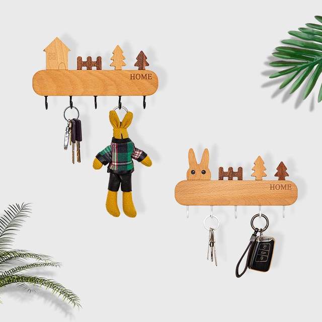 The key hook can enter the door. The key is closed. The wall decoration is hung on the wall key storage rack. The black solid wood loves the Nordic