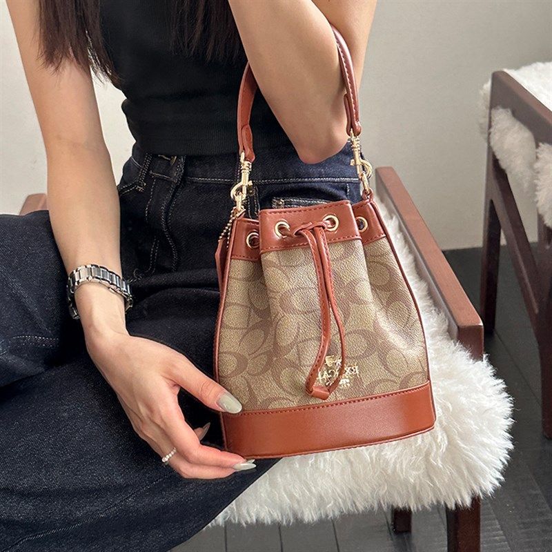 精致迷你抽绳水桶包小号2025新款高级感洋气手拎老花包斜挎小包包,淘宝优惠券,粉丝福利购,淘宝优惠卷