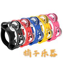 Orf childrens musical instrument Cahondrum accompaniment with double rows of feet on rattle and bells instrument wrist bells rattle rehearsals rehearsals