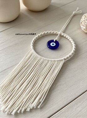 手工编织圆环蓝眼睛挂毯