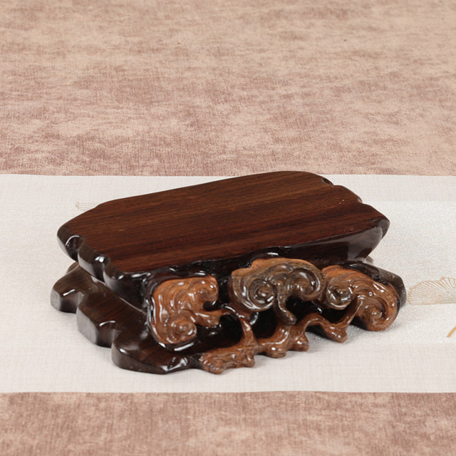 Ebony whole wood root carving with grooveable stone base